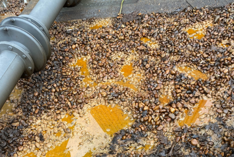 close up image of the floor within a dirty transformer bund