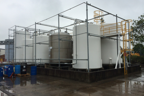 six large oil tanks and secondary containment on a COMAH site