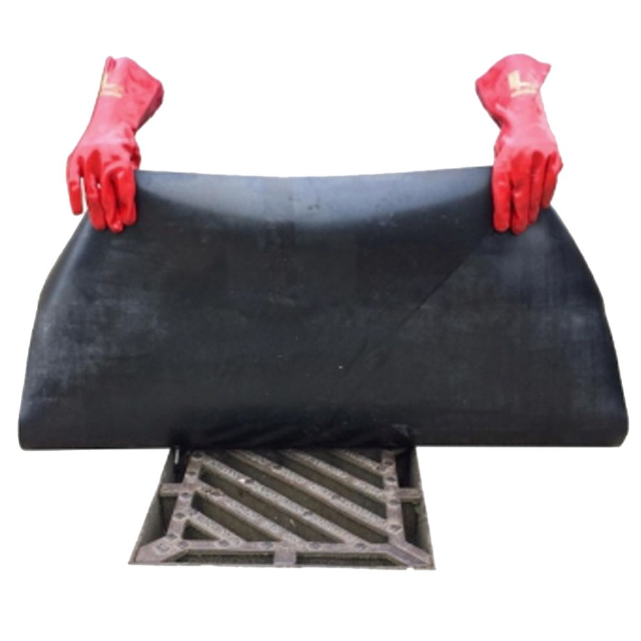 two hands holding a polyurethane cover over a drain to demonstrate application