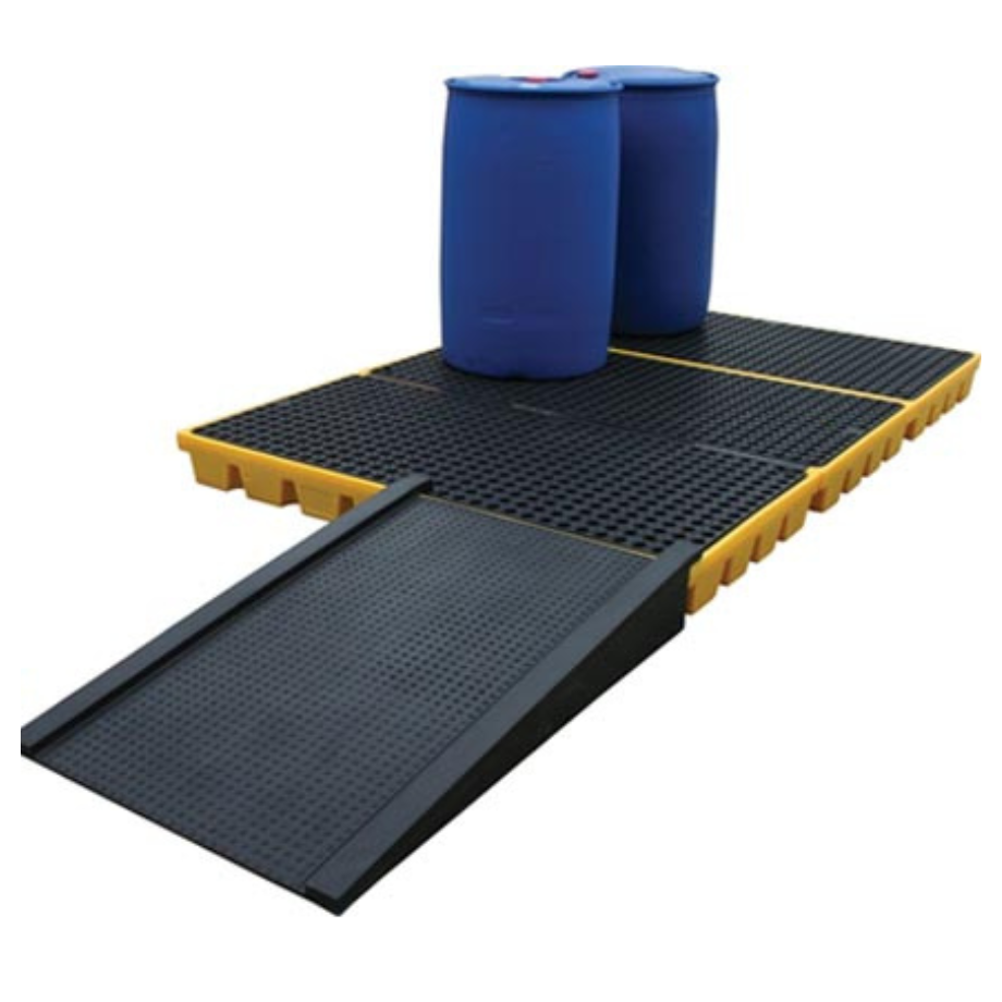 two blue drums on sump flooring with a ramp leading up to the pallet